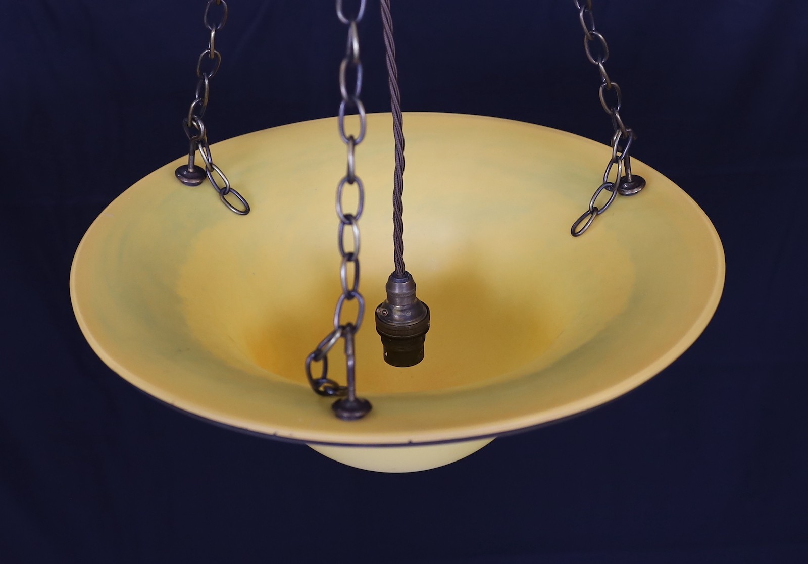 A 1930s style marbled glass light bowl with bronze chains and rose, drop 62cm, width 34cm